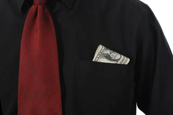 Dollarsedel i en skjorta ficka — Stockfoto