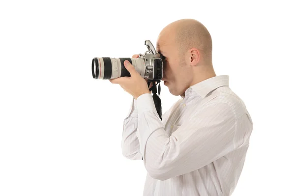 Człowiek posiada kamerę — Zdjęcie stockowe