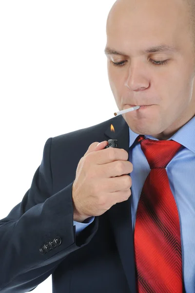 Бізнесмен в чорному костюмі тримає цигарку — стокове фото