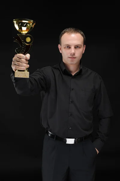 Işadamı kazanmak Kupası el ile — Stok fotoğraf