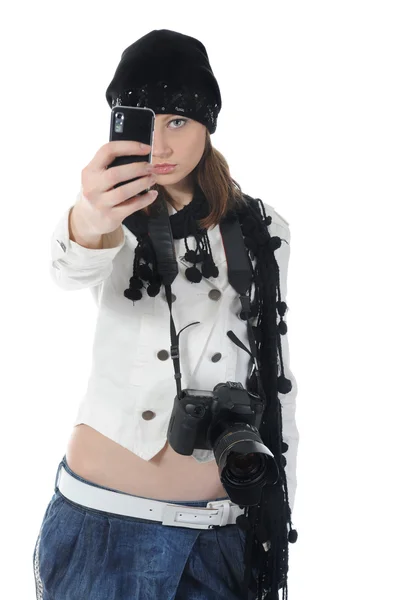 Vrouw houdt een camera — Stockfoto