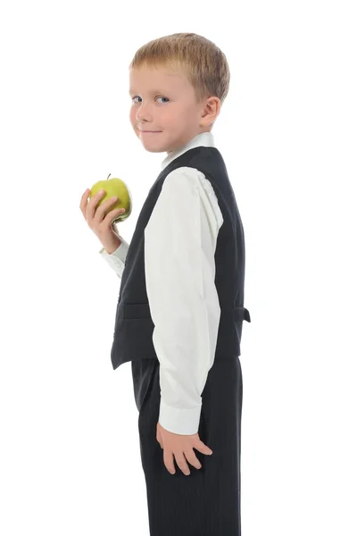 Menino segura uma maçã — Fotografia de Stock