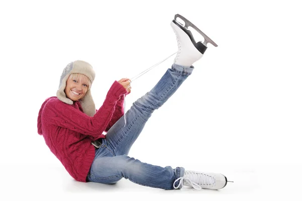 Menina bonita coloca em patins — Fotografia de Stock