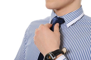 Picture of a business man adjusting his tie clipart