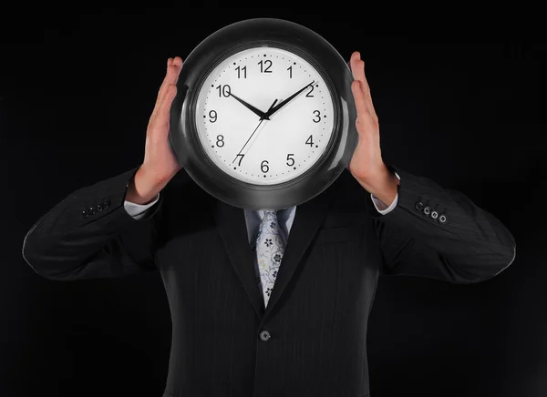 Man holds hours — Stock Photo, Image