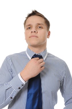 Picture of a business man adjusting his tie clipart