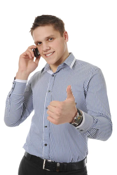 Leende ung man talar i telefon — Stockfoto