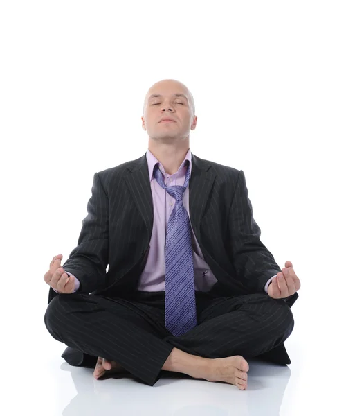 Uomo d'affari meditando in loto yoga — Foto Stock