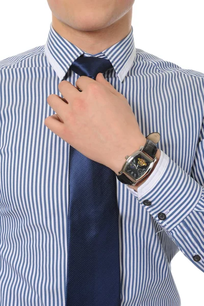 Picture of a business man adjusting his tie — Stock Photo, Image