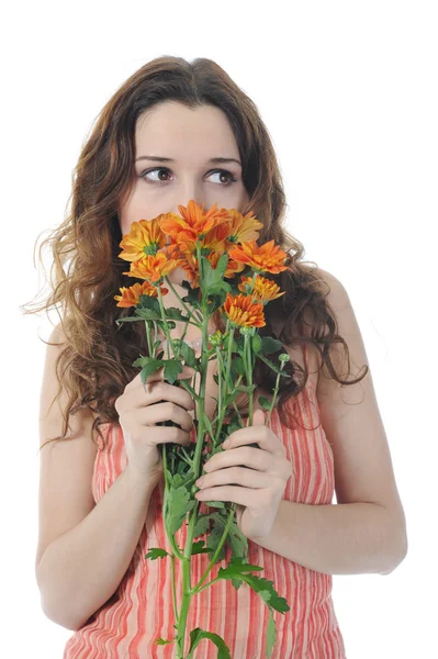 Brunett med en blomma — Stockfoto