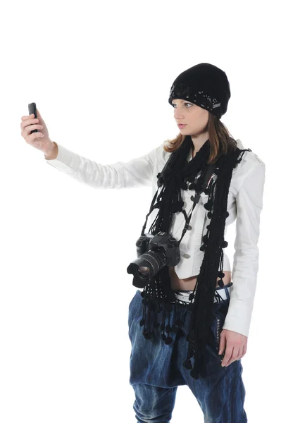Mulher segura uma câmera — Fotografia de Stock