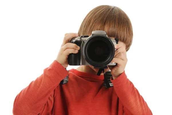Pojken håller en kamera — Stockfoto