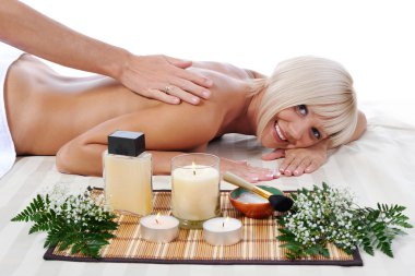 Massage in the spa salon clipart