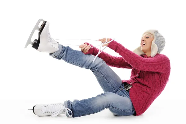 stock image Beautiful girl puts on skates