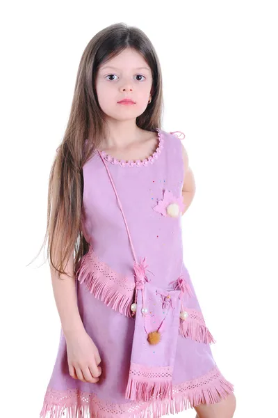 Маленька дівчинка в золотій сукні — стокове фото