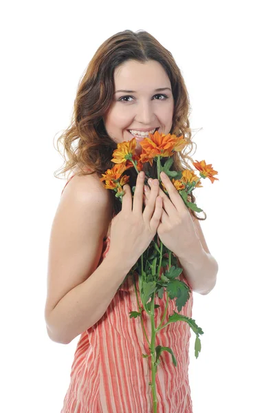 Brunett med en blomma — Stockfoto
