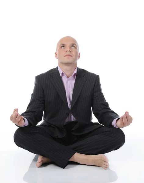 Zakenman mediteren in yoga lotus — Stockfoto