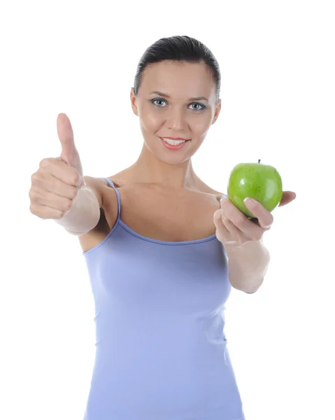 緑のリンゴを手で押し運動女の子 白い背景で隔離 — ストック写真