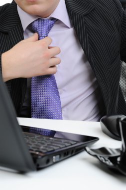 Business man adjusting his tie clipart