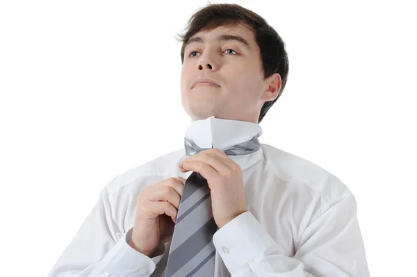 商人绑他的领带 在白色背景上孤立 — 图库照片
