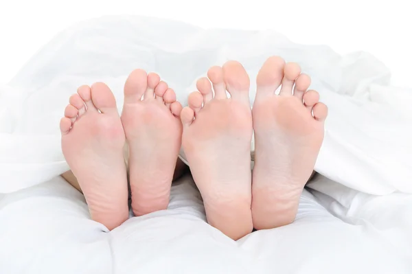 Close Feet Couple Bed Isolated White Background — Stock Photo, Image