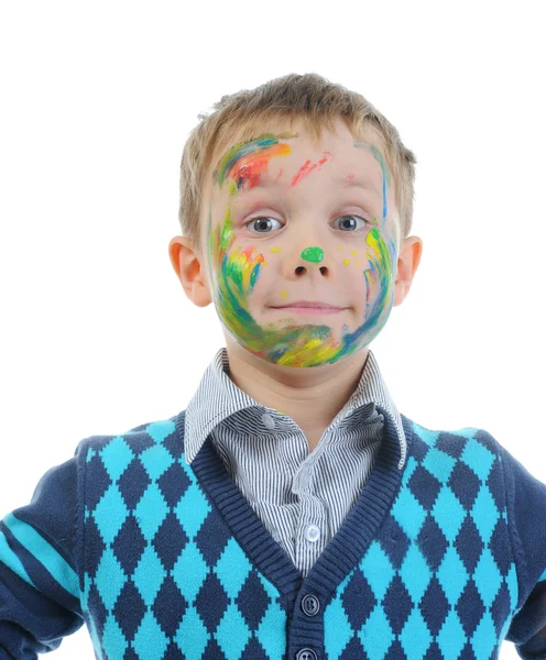 Boy with paint stained face — Stock Photo, Image