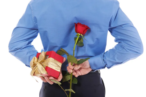 Man with a gift box and a rose — Stock Photo, Image