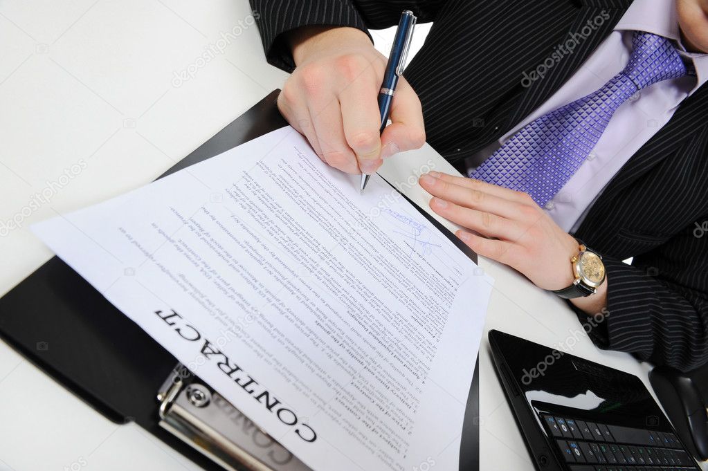 Businessman signs a contract