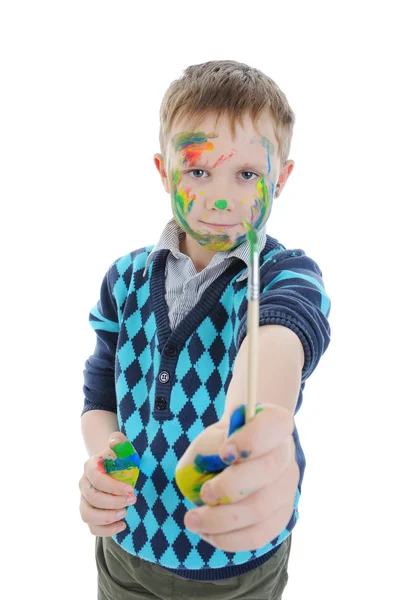 Smiling boy with the paintbrush. — Stock Photo, Image