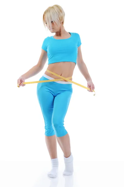 若い運動女性の腰の測定. — ストック写真