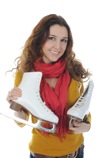 スタジオでスケートを持つ若い笑顔の女性 白い背景で隔離 — ストック写真