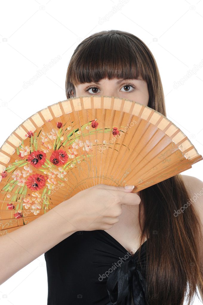 Portrait of a beautiful young woman with a fan. Isolated on white background