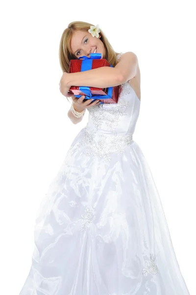 Bride hugging gift box. — Stock Photo, Image