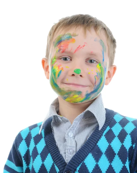 Boy with paint stained face — Stock Photo, Image