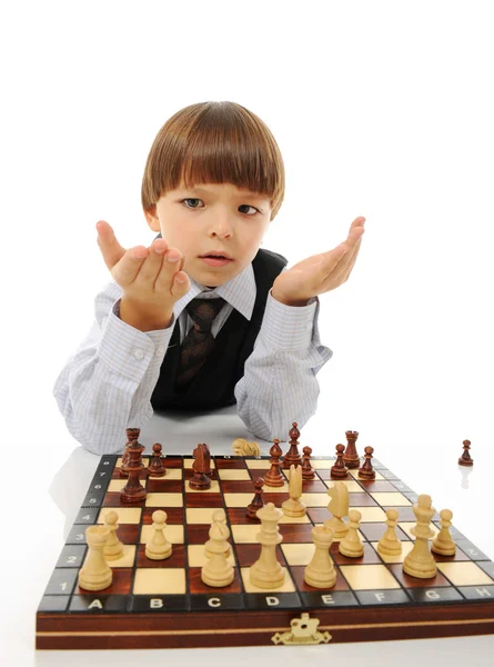 Schoolboy playing chess — Stock Photo, Image