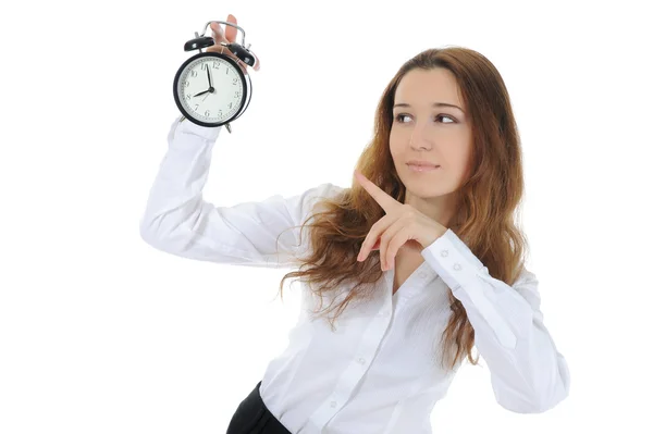 Woman with an alarm clock in a hand. — Stock Photo, Image