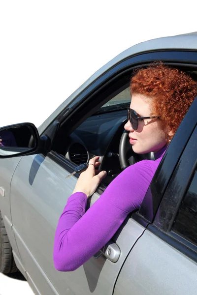 Woman driving her new car — Stock Photo, Image