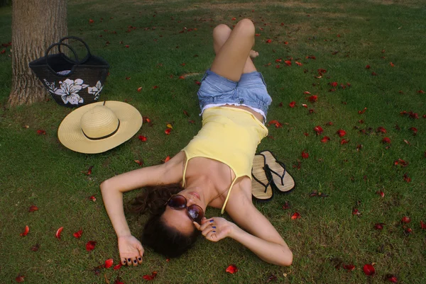 stock image Woman relaxing in the park