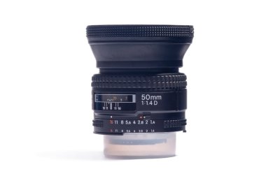 Black camera lens isolated in white bac clipart