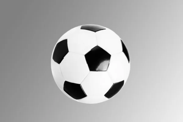 Balón de fútbol aislado sobre fondo degradado —  Fotos de Stock