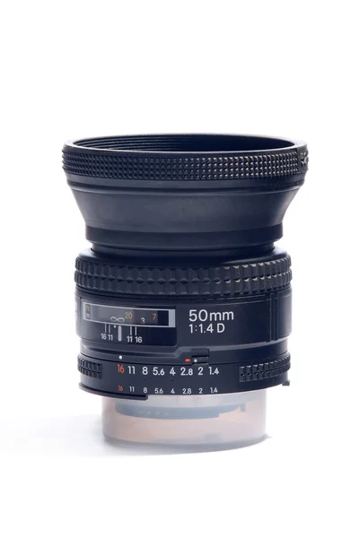 Black camera lens in white background — Stock Photo, Image