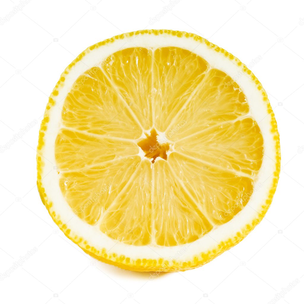 Close up of a sliced lemon over white