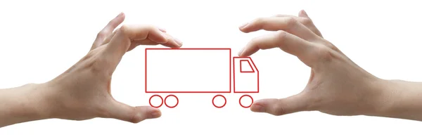Handen met concept rode vrachtwagen — Stockfoto