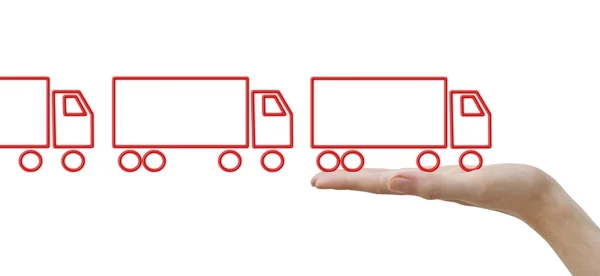 Mãos com conceito caminhões vermelhos — Fotografia de Stock