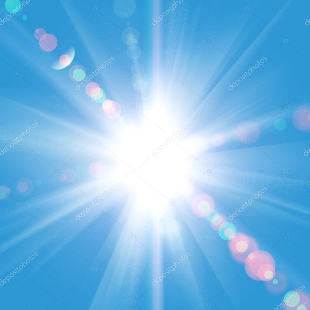 Sun rays against a blue sky