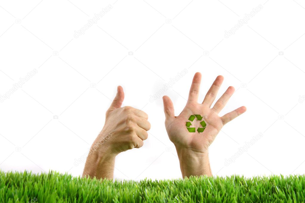 Hands in the grass on white