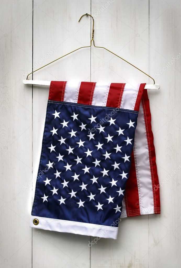 American flag folded with clothes hanger