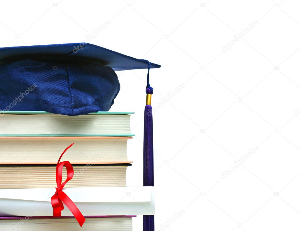 Stack of books with cap and diploma on white