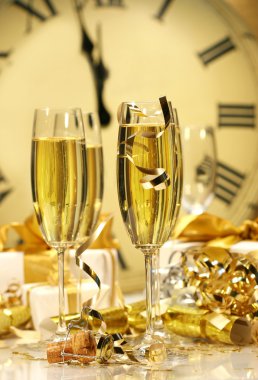 Champagne glasses ready to bring in the New Year clipart