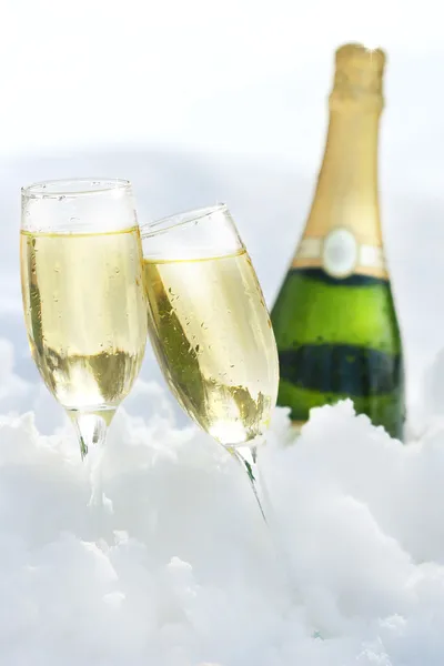 Champagne in the snow — Stock Photo, Image